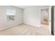 Bedroom with carpeted floor and a window with a view of outside at 2058 Brookhill Way, Snellville, GA 30078