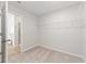 Walk-in closet with wire shelving and carpeted floors at 2058 Brookhill Way, Snellville, GA 30078