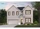 Charming two-story white brick home with a two-car garage, manicured lawn, and professional landscaping at 2058 Brookhill Way, Snellville, GA 30078