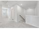 Upstairs hallway with neutral carpet and white walls at 2058 Brookhill Way, Snellville, GA 30078