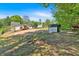 Expansive backyard with a shed and a covered patio, perfect for outdoor activities at 144 Cathy Ln, Hiram, GA 30141