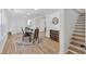 Dining room with hardwood floors and a staircase nearby at 144 Cathy Ln, Hiram, GA 30141