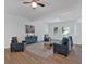 Open-concept living room features stylish furniture and plenty of natural light at 144 Cathy Ln, Hiram, GA 30141