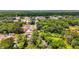 Residential property with lush trees near the main road and commercial district of a rural town at 407 E College E St, Bowdon, GA 30108