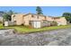 Home's exterior view from backyard, showcasing fencing, grass, and neighboring properties at 2039 Oak Park Ln, Decatur, GA 30032