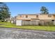 Backyard view with a fenced yard, grass, and a partial view of the home's exterior at 2039 Oak Park Ln, Decatur, GA 30032