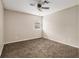 Bedroom with carpet, ceiling fan and a window with blinds at 2039 Oak Park Ln, Decatur, GA 30032