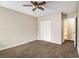 Bedroom features carpet, a closet and ceiling fan with lights at 2039 Oak Park Ln, Decatur, GA 30032