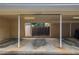 View of the carport featuring painted vertical supports, lights, and the address '2039' at 2039 Oak Park Ln, Decatur, GA 30032