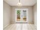 Bright dining area with tile floor, french doors, and neutral wall color at 2039 Oak Park Ln, Decatur, GA 30032