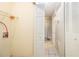 Bright hallway with storage shelves, laundry connections, and access to other rooms at 2039 Oak Park Ln, Decatur, GA 30032