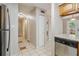 View from kitchen, showing stainless dishwasher, hall, and refrigerator at 2039 Oak Park Ln, Decatur, GA 30032