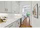 Modern butler's pantry with quartz countertops and cabinetry at 259 Sisson Ave, Atlanta, GA 30317