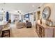 Spacious living room featuring an open-concept design with a fireplace and lots of natural light at 6775 Marlow Dr, Cumming, GA 30041