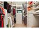 Walk-in closet with custom shelving and ample storage space for an organized wardrobe at 6775 Marlow Dr, Cumming, GA 30041