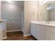Bathroom featuring modern vanity, neutral paint, and a standing shower at 725 Signature Trce, Palmetto, GA 30268