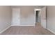 A cozy bedroom with plush carpeting and neutral paint, offering a blank canvas for personalization at 725 Signature Trce, Palmetto, GA 30268