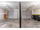 Spacious two-car garage with automatic door openers and ample storage space for vehicles and tools at 725 Signature Trce, Palmetto, GA 30268