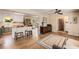 View of the living room and kitchen offering a spacious, open-concept design with plenty of natural light at 107 Bowen Rd, Stockbridge, GA 30281