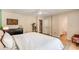 Bright main bedroom featuring hardwood floors, lots of closet space, and neutral decor at 107 Bowen Rd, Stockbridge, GA 30281
