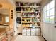 Well-stocked pantry offering plenty of storage space with ample shelves and containers at 107 Bowen Rd, Stockbridge, GA 30281