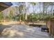 Spacious wooden deck with built-in benches, perfect for outdoor entertaining and relaxing at 3698 Sharon Dr, Powder Springs, GA 30127
