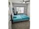 Bedroom with ceiling fan, carpet flooring, natural light and desk at 1177 Chastain Dr, Sugar Hill, GA 30518