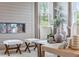 Close-up of a modern fireplace with elegant decor, adjacent to bright windows at 2078 Brookhill Way, Snellville, GA 30078
