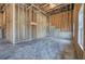 Unfinished basement showcasing a clean slate with wood framing and concrete floors, awaiting your personal touch at 30 Grand Georgian Ne Ct, Cartersville, GA 30121