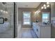 Bathroom featuring walk-in shower, soaking tub, double vanity with granite countertop, and tile flooring at 30 Grand Georgian Ne Ct, Cartersville, GA 30121