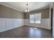 Dining room with hardwood floors, chandelier, and large windows at 30 Grand Georgian Ne Ct, Cartersville, GA 30121