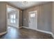 Hallway with hardwood floors that leads to a room with windows at 30 Grand Georgian Ne Ct, Cartersville, GA 30121