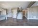 Open floor plan featuring a seamless flow between kitchen, stairs, and living area, perfect for modern living and entertaining at 30 Grand Georgian Ne Ct, Cartersville, GA 30121