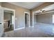 Main bedroom showcasing neutral paint, trim detail and multiple doorways at 30 Grand Georgian Ne Ct, Cartersville, GA 30121