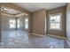 Main bedroom featuring large windows, tray ceiling, neutral colors and carpet at 30 Grand Georgian Ne Ct, Cartersville, GA 30121
