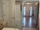 Entryway featuring a straight-on view of the front door, coat closet, and views to the living spaces at 4237 Webb Meadows Dr, Loganville, GA 30052