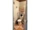 This half bathroom features a toilet, and artwork, offering a convenient space for guests at 4237 Webb Meadows Dr, Loganville, GA 30052