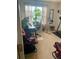 This is a home office featuring an office chair, desk, and exercise equipment at 4237 Webb Meadows Dr, Loganville, GA 30052