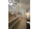 This primary bedroom has neutral-tone walls, carpet, and a large dresser at 4237 Webb Meadows Dr, Loganville, GA 30052
