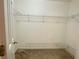 Walk-in closet with wire shelving for storage at 6214 Treeridge Nw Dr, Acworth, GA 30101