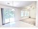 Bright dining area with sliding glass door leading to the backyard at 6214 Treeridge Nw Dr, Acworth, GA 30101