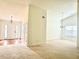 Bright entryway with hardwood floors, coat closet, and view into the living area at 6214 Treeridge Nw Dr, Acworth, GA 30101
