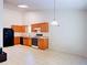 A bright kitchen features wooden cabinetry and appliances at 6214 Treeridge Nw Dr, Acworth, GA 30101