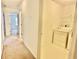 Hallway view into the laundry room with washer and dryer at 6214 Treeridge Nw Dr, Acworth, GA 30101