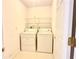 Convenient laundry room with washer, dryer, and shelving at 6214 Treeridge Nw Dr, Acworth, GA 30101