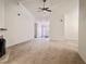 Open-concept living room with fireplace and view to the front entry at 6214 Treeridge Nw Dr, Acworth, GA 30101