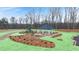 The community playground with a gazebo is surrounded by lush greenery for recreational activities at 356 Sound Cir, Stockbridge, GA 30281