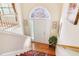 Bright foyer with hardwood flooring and staircase leading to the upper level at 3709 Mcguire Nw St, Kennesaw, GA 30144