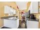 Kitchen with granite countertops, stainless steel appliances, and a view into the dining area at 3709 Mcguire Nw St, Kennesaw, GA 30144