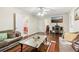 Cozy living room featuring hardwood floors, neutral paint, and comfortable seating at 3709 Mcguire Nw St, Kennesaw, GA 30144
